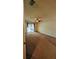 Bedroom featuring carpet flooring, a ceiling fan, and sliding glass doors to the pool area at 23059 Geneva Rd, Land O Lakes, FL 34639
