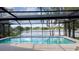 Screened pool with beautiful lake views and plenty of space for entertaining at 23059 Geneva Rd, Land O Lakes, FL 34639