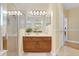 Bathroom features a glass enclosed shower and a vanity with a white countertop at 2605 Durant Trails Blvd, Dover, FL 33527