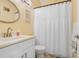 Bathroom with vanity, toilet, and a shower/tub combination with a curtain at 2605 Durant Trails Blvd, Dover, FL 33527