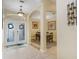 Grand entry foyer with arched openings and beautiful tile flooring at 2605 Durant Trails Blvd, Dover, FL 33527