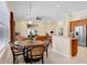 Open-concept kitchen seamlessly flows into the dining and living areas at 2605 Durant Trails Blvd, Dover, FL 33527