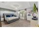 Spacious bedroom featuring a tray ceiling, decorative accents, and ample natural light at 3011 49Th S Ter, St Petersburg, FL 33712