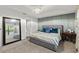 Relaxing bedroom with a neutral color palette, stylish decor, and carpeted floors at 3011 49Th S Ter, St Petersburg, FL 33712