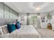 Bright and airy bedroom with tray ceiling, stylish decor, and natural light at 3011 49Th S Ter, St Petersburg, FL 33712