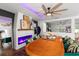 Elegant dining room with a large wooden table, unique decor, and modern lighting at 3011 49Th S Ter, St Petersburg, FL 33712