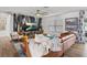 Bright living room with modern furnishings, decorative wall art and a large entertainment center at 3011 49Th S Ter, St Petersburg, FL 33712