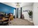 This home office offers ample desk space, natural light, and a comfortable workspace at 3011 49Th S Ter, St Petersburg, FL 33712