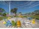 Colorful seating area at the St. Pete Pier with a view of the waterfront and surrounding buildings at 3011 49Th S Ter, St Petersburg, FL 33712