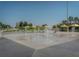 Interactive splash pad with fountains and colorful umbrellas at the St. Pete Pier at 3011 49Th S Ter, St Petersburg, FL 33712