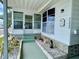 Charming entrance with decorative landscaping, covered porch and a 