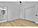 Light-filled bedroom with closet and ensuite bathroom with tiled vanity at 38151 Sunset Ave, Dade City, FL 33525