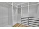 Walk-in closet with shelving and drawers for storage solutions at 38151 Sunset Ave, Dade City, FL 33525