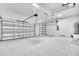 Spacious three car garage with multiple garage doors at 38151 Sunset Ave, Dade City, FL 33525
