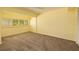 Spacious bedroom with carpet, natural light, and blank walls at 4207 Fairway Run, Tampa, FL 33618