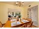 Stylish dining room adjacent to the living room offers ample space for entertaining and Gathering gatherings at 4207 Fairway Run, Tampa, FL 33618