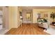 Bright and airy living room featuring hardwood floors and seamless flow into other living spaces at 4207 Fairway Run, Tampa, FL 33618
