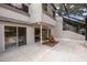 Spacious backyard patio with outdoor seating and partial enclosure, perfect for entertaining or relaxing at 4207 Fairway Run, Tampa, FL 33618