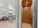Modern home elevator with light wood paneling, providing easy access between floors and comfortable living at 4215 Saltwater Pearl Way, Cortez, FL 34215