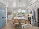 Beautiful kitchen with white cabinets, stainless steel appliances, and a stylish island at 4215 Saltwater Pearl Way, Cortez, FL 34215