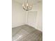 Cozy bedroom with closet space and chandelier lighting at 607 Manchester Woods Dr # 84, Sun City Center, FL 33573