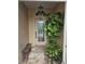 Entryway with paver flooring, a bench, and a leafy green plant at 607 Manchester Woods Dr # 84, Sun City Center, FL 33573