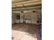 Spacious garage area with laundry and storage options at 607 Manchester Woods Dr # 84, Sun City Center, FL 33573