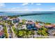 Expansive aerial view highlights waterfront property, beautiful landscaping, pool, and serene surroundings at 6357 Bahia Del Mar Blvd # 403, St Petersburg, FL 33715