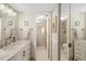 Modern bathroom with walk-in shower, custom vanity, and ample lighting at 6357 Bahia Del Mar Blvd # 403, St Petersburg, FL 33715