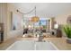 A view from the kitchen through the dining room into the living room at 6357 Bahia Del Mar Blvd # 403, St Petersburg, FL 33715