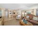 Open-concept living space with a dining area, kitchen view, and a spacious living room at 6357 Bahia Del Mar Blvd # 403, St Petersburg, FL 33715