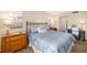 Inviting bedroom with a comfortable bed, nautical decor, and relaxing ambiance at 6357 Bahia Del Mar Blvd # 403, St Petersburg, FL 33715