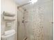 Walk-in shower with custom tilework and modern fixtures, offering a spa-like experience at 6357 Bahia Del Mar Blvd # 403, St Petersburg, FL 33715