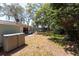 Spacious backyard featuring a patio and lawn at 7339 Royal Palm Dr, New Port Richey, FL 34652