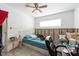 Bedroom featuring a window view, ceiling fan, and neutral paint at 7339 Royal Palm Dr, New Port Richey, FL 34652