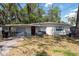 Charming single-story home featuring a cozy front yard and inviting curb appeal at 7339 Royal Palm Dr, New Port Richey, FL 34652