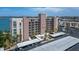 Stunning view of The Commodore 7700, showcasing its architecture and covered parking at 7700 Sun Island S Dr # 107, South Pasadena, FL 33707