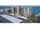 Beautiful building exterior with covered parking and lovely water views in a desirable location at 7700 Sun Island S Dr # 107, South Pasadena, FL 33707