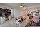 Bright living room features stylish decor, wood-look flooring, and an open layout with kitchen view at 7700 Sun Island S Dr # 107, South Pasadena, FL 33707