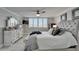 Serene main bedroom with water views, plantation shutters, and neutral color palette at 7700 Sun Island S Dr # 107, South Pasadena, FL 33707