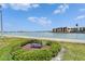 Enjoy waterfront views from this bench surrounded by well-manicured landscaping at 7700 Sun Island S Dr # 107, South Pasadena, FL 33707