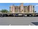 Outdoor parking lot with parked vehicles and a view of the building complex at 7700 Sun Island S Dr # 107, South Pasadena, FL 33707
