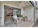 Inviting outdoor patio with comfortable seating and open views at 7700 Sun Island S Dr # 107, South Pasadena, FL 33707