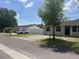 Cozy single-Gathering home showcasing a driveway, well-maintained landscaping, and a peaceful neighborhood setting at 8804 Briar Hollow Ct, Tampa, FL 33634