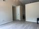 Bright and airy living room featuring modern floors, neutral walls, and high ceilings at 8804 Briar Hollow Ct, Tampa, FL 33634