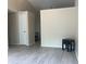 Bright and airy living room featuring modern floors, neutral walls, and high ceilings at 8804 Briar Hollow Ct, Tampa, FL 33634