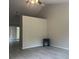 Spacious living area featuring modern floors and high ceilings at 8804 Briar Hollow Ct, Tampa, FL 33634