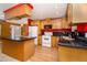Spacious kitchen with a breakfast bar and stainless steel appliances at 9130 Dresden Ln, Port Richey, FL 34668