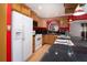Bright kitchen featuring a breakfast bar, and stainless appliances at 9130 Dresden Ln, Port Richey, FL 34668