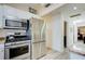 Modern kitchen showcasing stainless steel appliances and an efficient layout for cooking at 921 24Th N Ave, St Petersburg, FL 33704